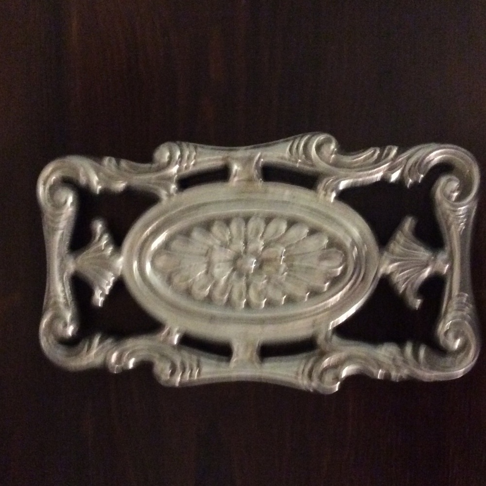 Silver metal trivet